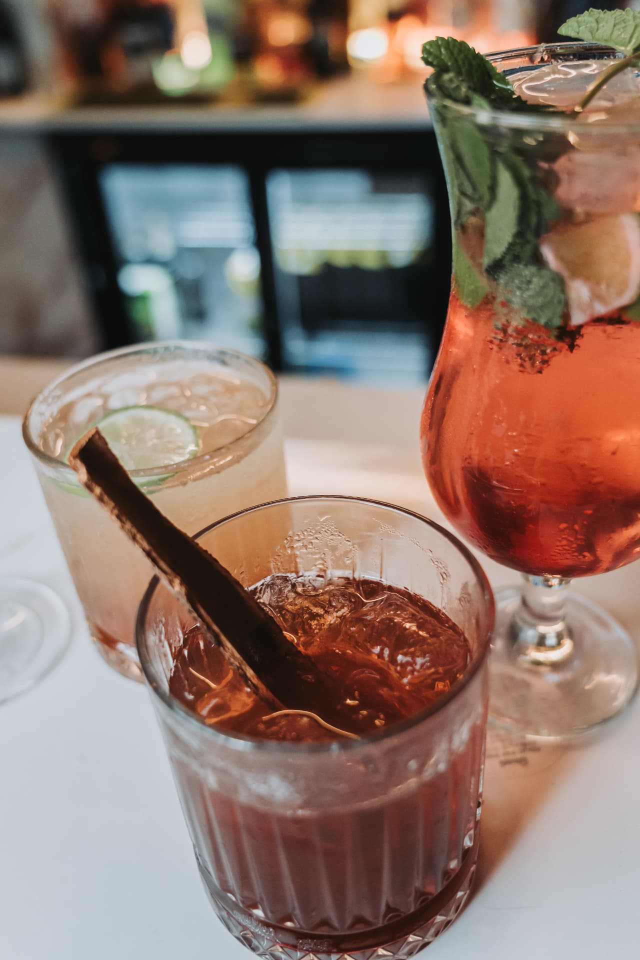 Three coloured cocktails garnished with cinnamon at the Anaya bar