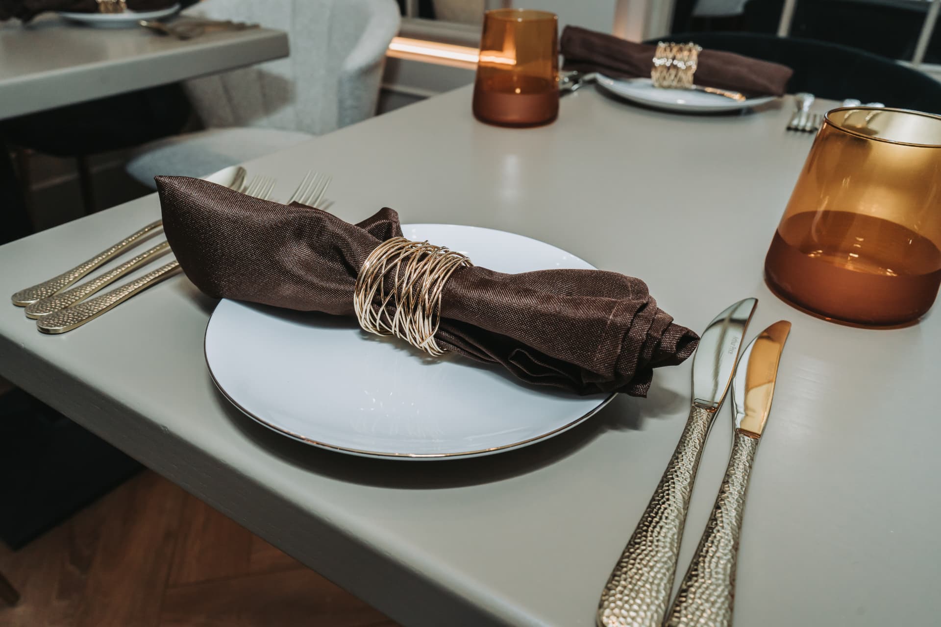 A wide place setting with Arthur Price cutlery in the Anaya dining room