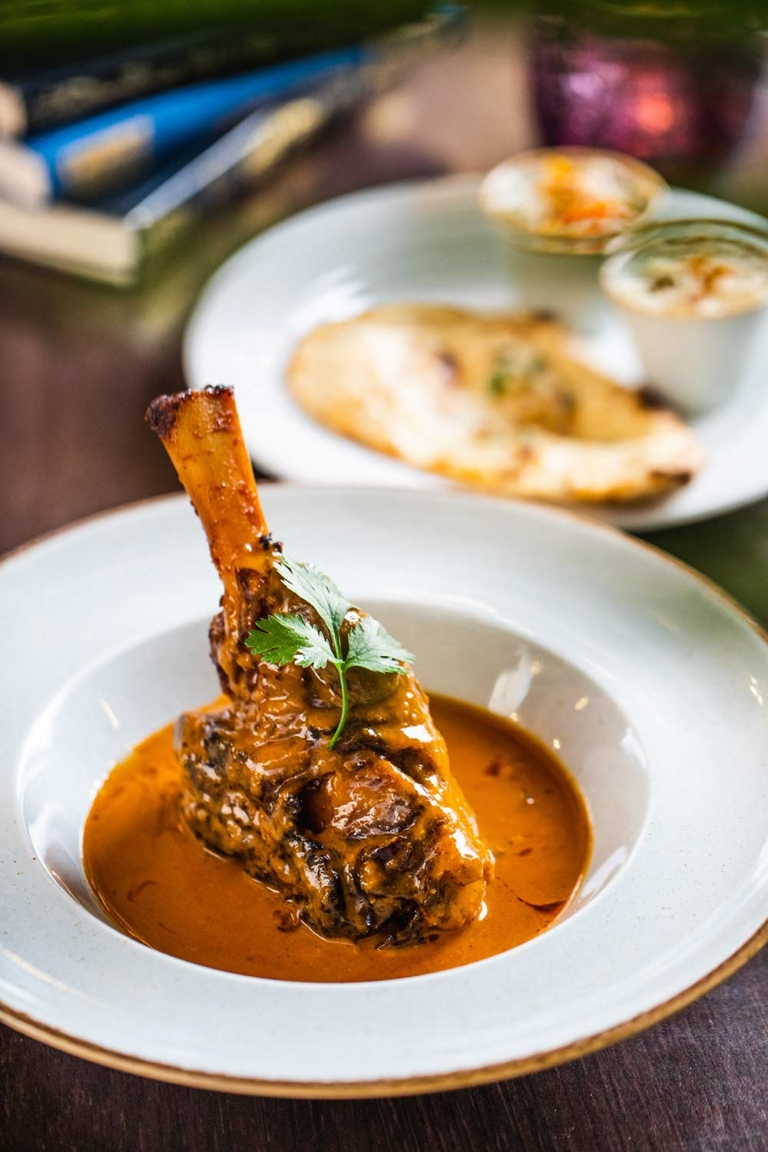 Slow-cooked lamb shank in a rich curry sauce